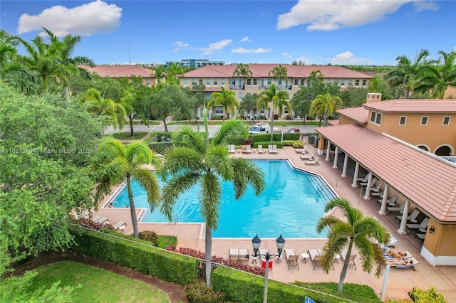 1214 SW 147th Ter, Pembroke Pines, FL 33027 - community pool featuring a patio area and a residential view