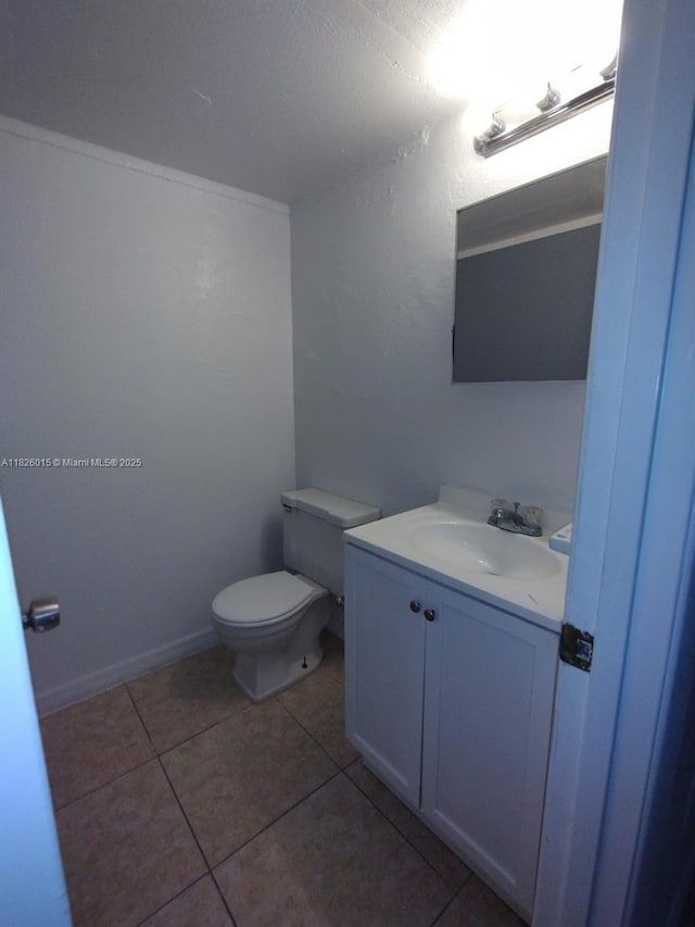 2775 L B Mcleod St Unit B, Orlando, FL 32805 - half bathroom with vanity and tile patterned flooring