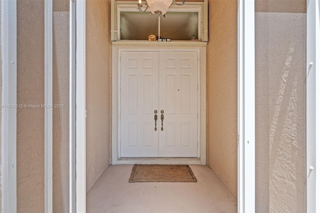 7348 Copperfield Cir, Lake Worth, FL 33467 - doorway to property featuring stucco siding