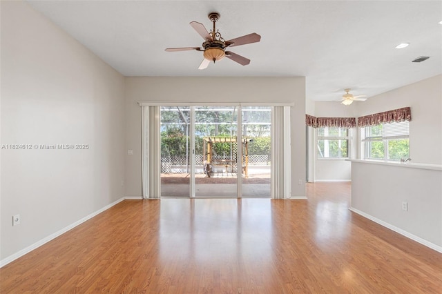 7348 Copperfield Cir, Lake Worth, FL 33467 - unfurnished room featuring wood finished floors and ceiling fan