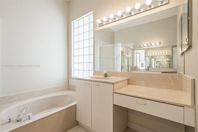 7348 Copperfield Cir, Lake Worth, FL 33467 - full bathroom featuring a garden tub, a shower stall, and vanity