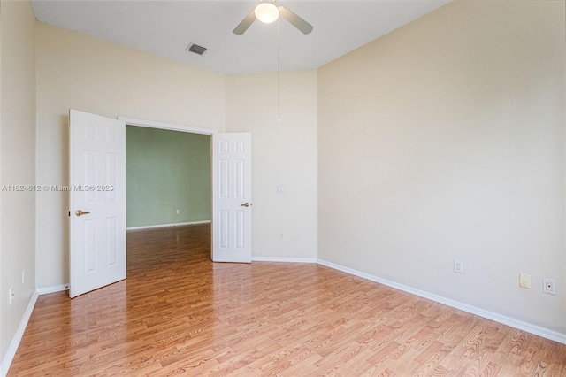 7348 Copperfield Cir, Lake Worth, FL 33467 - spare room featuring light wood-type flooring and a ceiling fan