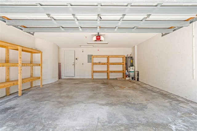 7348 Copperfield Cir, Lake Worth, FL 33467 - garage featuring electric panel, electric water heater, and a garage door opener