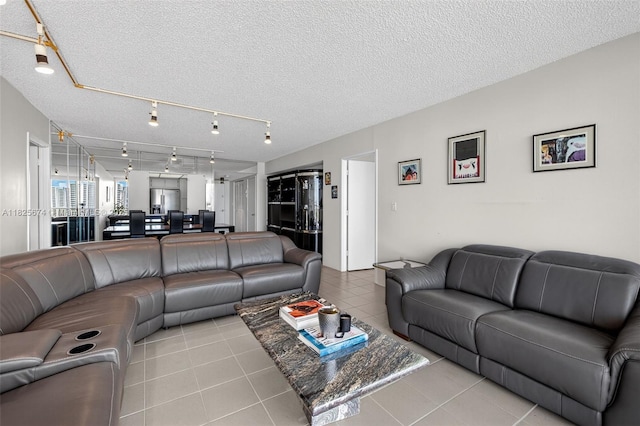 3701 N Country Club Dr Unit 2209, Aventura, FL 33180 - living room featuring tile patterned flooring and a textured ceiling