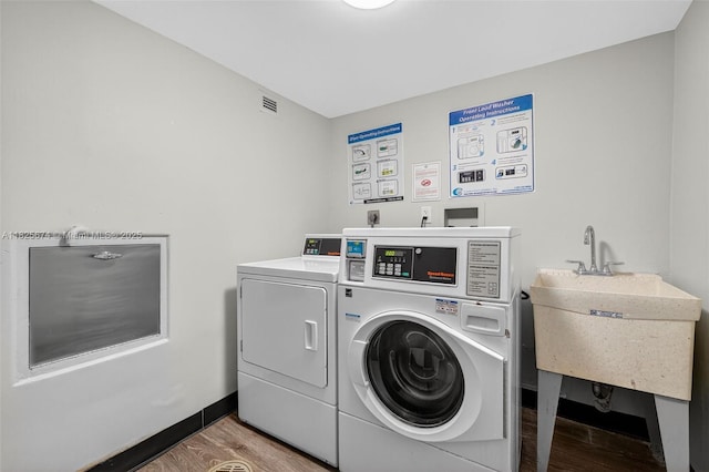 3701 N Country Club Dr Unit 2209, Aventura, FL 33180 - shared laundry room featuring independent washer and dryer and light wood-type flooring
