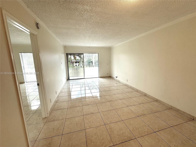 7900 Camino Cir Unit 305, Miami, FL 33143 - empty room with ornamental molding, a textured ceiling, light tile patterned flooring, and a smoke detector