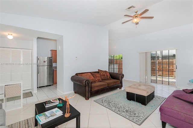 806 NE 214th Ln Unit 806-03, Miami, FL 33179 - living room with vaulted ceiling, ceiling fan, and light tile patterned floors
