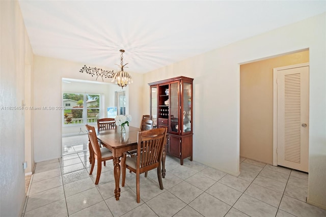 6905 NW 73rd St, Tamarac, FL 33321 - dining area featuring a chandelier and light tile patterned floors
