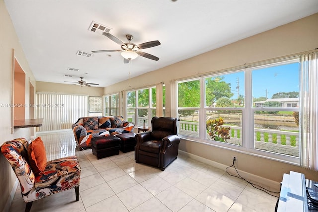 6905 NW 73rd St, Tamarac, FL 33321 - living room with ceiling fan and light tile patterned flooring