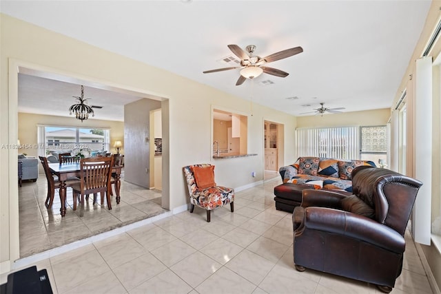 6905 NW 73rd St, Tamarac, FL 33321 - living room featuring a ceiling fan and light tile patterned flooring