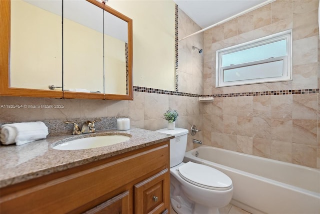 6905 NW 73rd St, Tamarac, FL 33321 - bathroom featuring vanity, shower / bath combination, tile walls, and backsplash