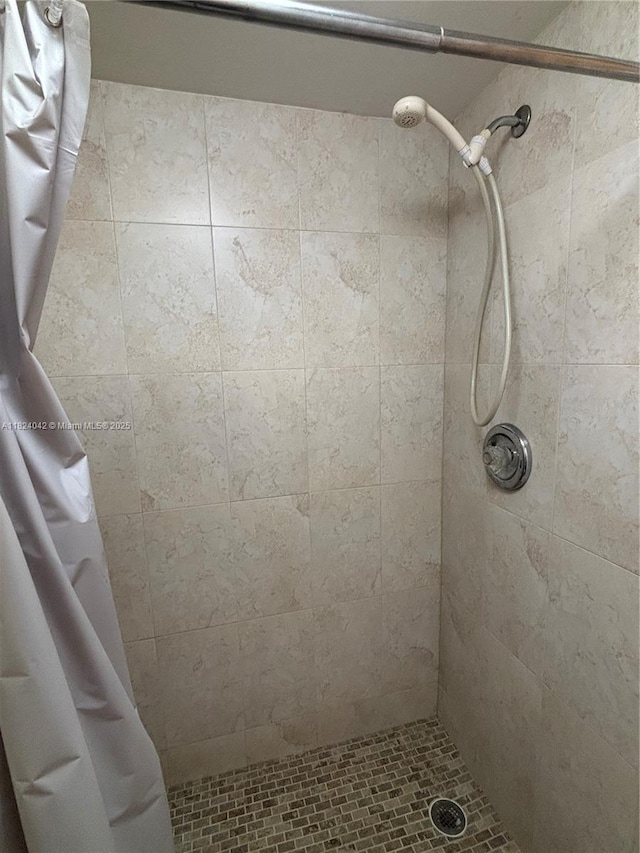 1635 W 44th Pl Unit 509, Hialeah, FL 33012 - full bathroom featuring a tile shower