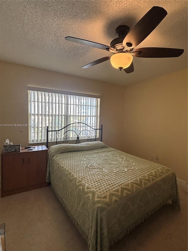 1635 W 44th Pl Unit 509, Hialeah, FL 33012 - bedroom featuring a textured ceiling and a ceiling fan