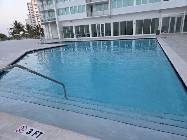 7135 Collins Ave Unit 424, Miami Beach, FL 33141 - community pool with a patio area