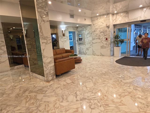 7135 Collins Ave Unit 424, Miami Beach, FL 33141 - lobby with a towering ceiling