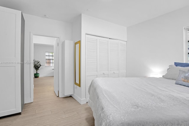 631 Euclid Ave Unit 8, Miami Beach, FL 33139 - bedroom featuring light wood finished floors and a closet