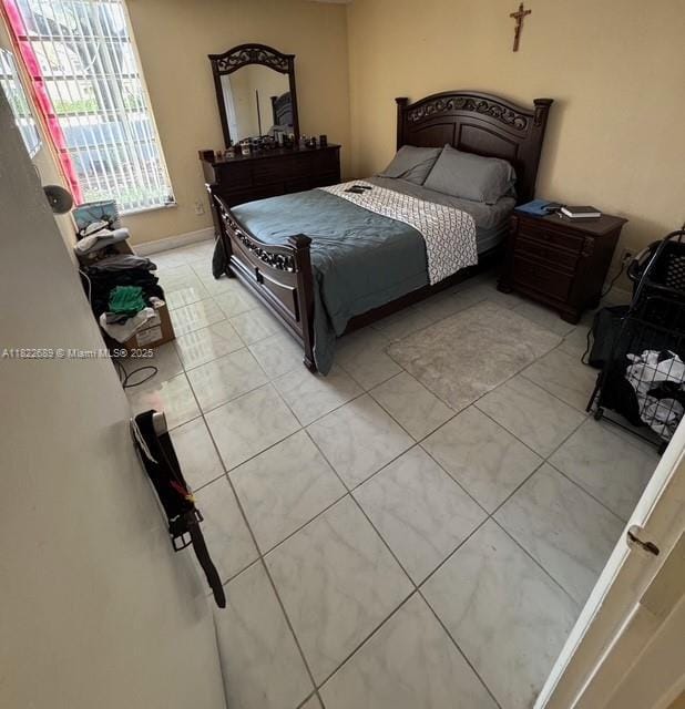 8841 W Flagler St Unit 108, Miami, FL 33174 - bedroom featuring light tile patterned floors