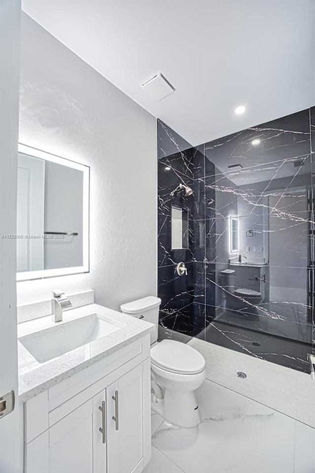 817/819 Eisenhower Blvd, Lehigh Acres, FL 33974 - bathroom with vanity, a marble finish shower, marble look tiles, a textured wall, and recessed lighting