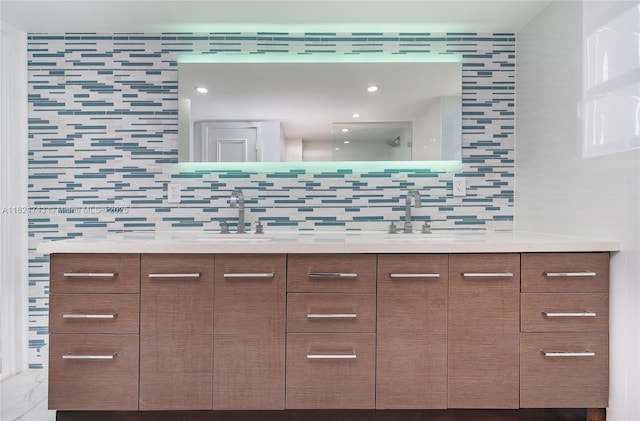 5555 Collins Ave Unit 7N, Miami Beach, FL 33140 - detailed view of a sink and tasteful backsplash