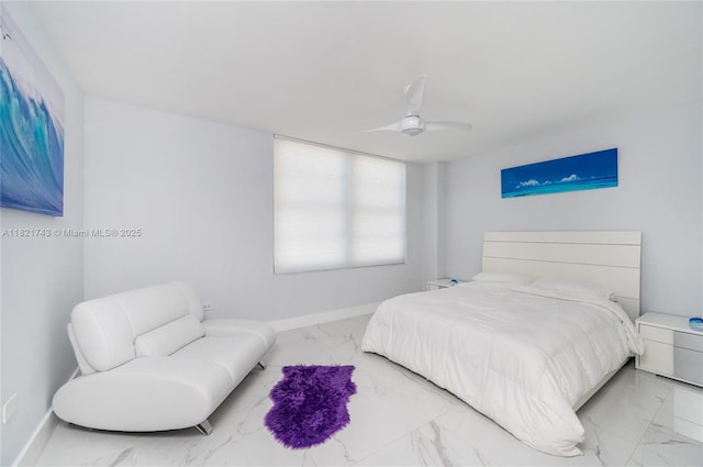 5555 Collins Ave Unit 7N, Miami Beach, FL 33140 - bedroom with light marble finish floors and ceiling fan