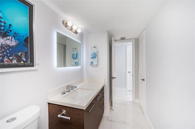 5555 Collins Ave Unit 7N, Miami Beach, FL 33140 - bathroom featuring marble finish flooring and vanity