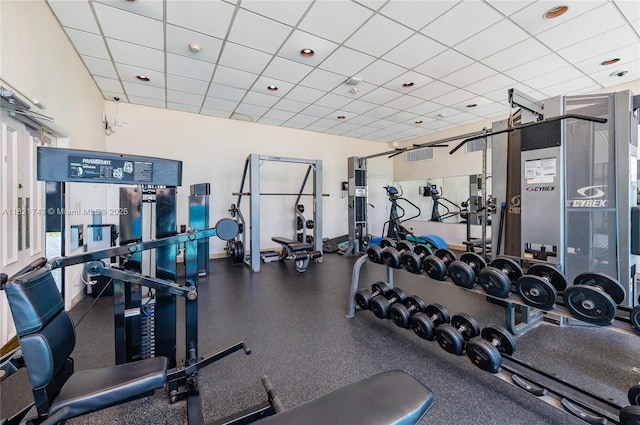 5555 Collins Ave Unit 7N, Miami Beach, FL 33140 - gym featuring a paneled ceiling
