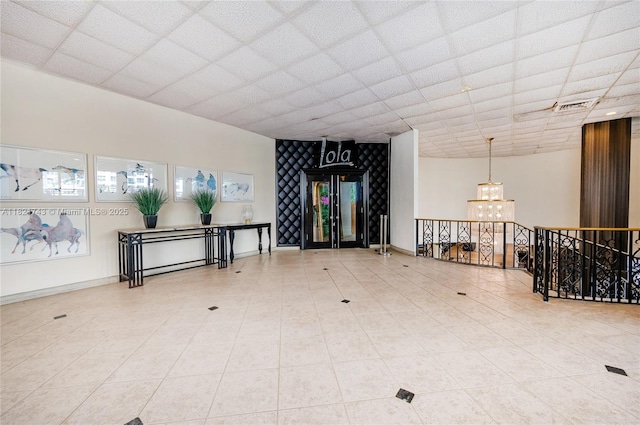 5555 Collins Ave Unit 7N, Miami Beach, FL 33140 - building lobby featuring a paneled ceiling