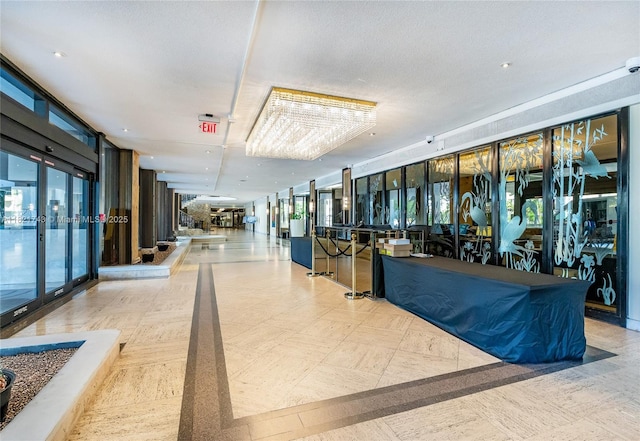 5555 Collins Ave Unit 7N, Miami Beach, FL 33140 - lobby with a surveillance system