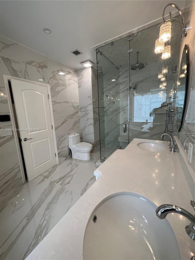 16546 SW 39th St, Miramar, FL 33027 - bathroom featuring a marble finish shower, a chandelier, double vanity, and marble tiled flooring