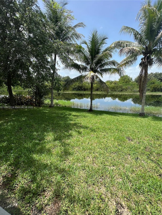16546 SW 39th St, Miramar, FL 33027 - view of green lawn with a water view
