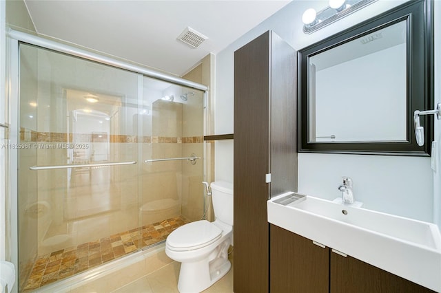 6440 NW 114th Ave Unit 434, Doral, FL 33178 - bathroom featuring a stall shower, vanity, and tile patterned flooring