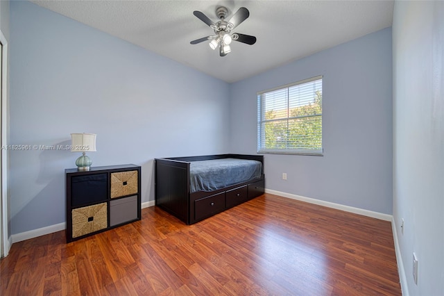 6440 NW 114th Ave Unit 434, Doral, FL 33178 - bedroom with wood finished floors and ceiling fan