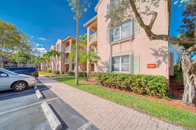 6440 NW 114th Ave Unit 434, Doral, FL 33178 - view of property featuring uncovered parking