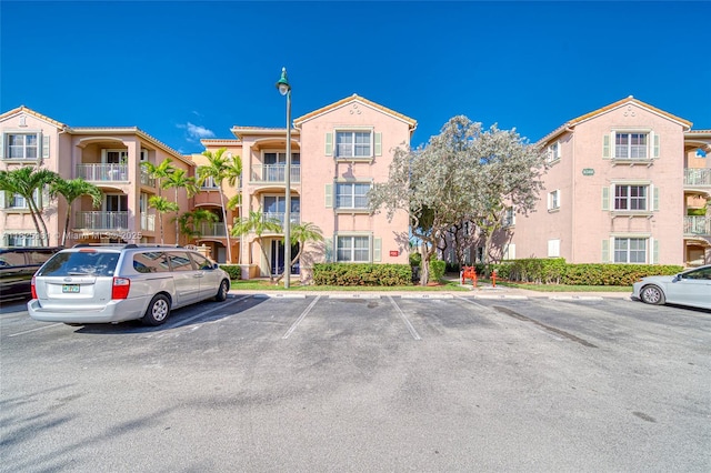 6440 NW 114th Ave Unit 434, Doral, FL 33178 - view of apartment building / complex with uncovered parking