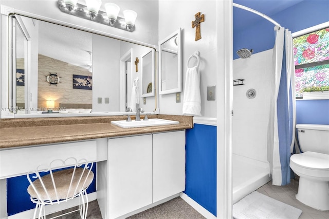 4552 Carambola Cir S Unit 27247, Coconut Creek, FL 33066 - full bathroom with vanity, a shower stall, and tile patterned floors