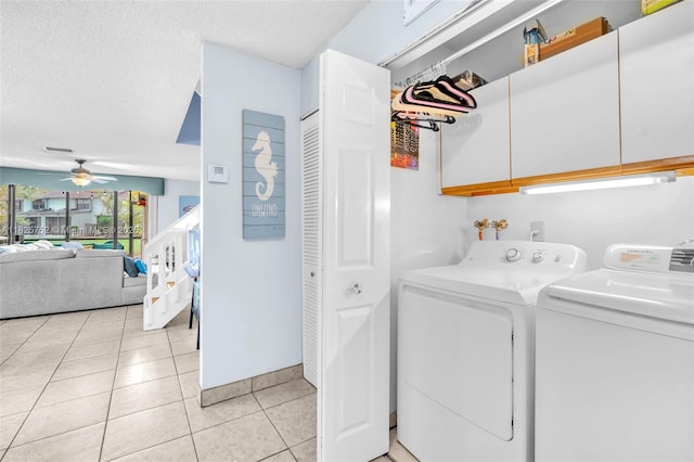 4552 Carambola Cir S Unit 27247, Coconut Creek, FL 33066 - laundry room with independent washer and dryer, ceiling fan, cabinet space, and light tile patterned floors