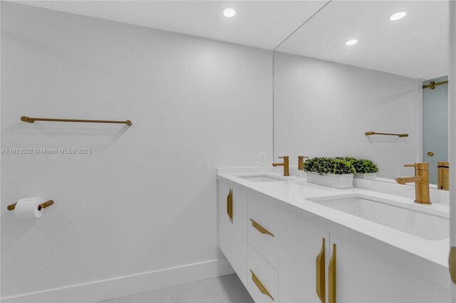 1201 S Ocean Dr Unit 507S, Hollywood, FL 33019 - bathroom featuring double vanity and recessed lighting