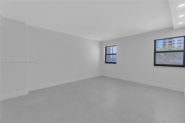 1201 S Ocean Dr Unit 507S, Hollywood, FL 33019 - empty room with recessed lighting and finished concrete floors