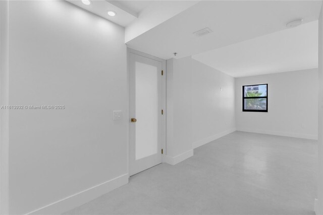 1201 S Ocean Dr Unit 507S, Hollywood, FL 33019 - spare room with concrete floors and recessed lighting