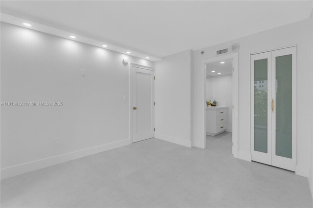 1201 S Ocean Dr Unit 507S, Hollywood, FL 33019 - spare room with recessed lighting and concrete floors
