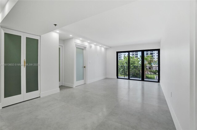 1201 S Ocean Dr Unit 507S, Hollywood, FL 33019 - spare room with recessed lighting, concrete floors, and fire sprinkler in ceiling