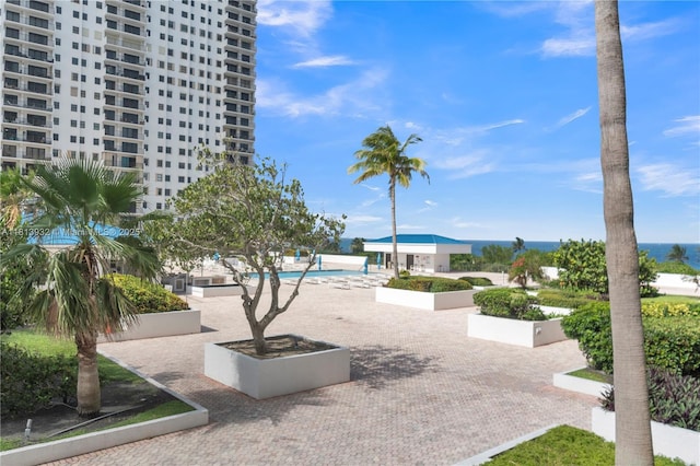 1201 S Ocean Dr Unit 507S, Hollywood, FL 33019 - view of community featuring a swimming pool and a patio area
