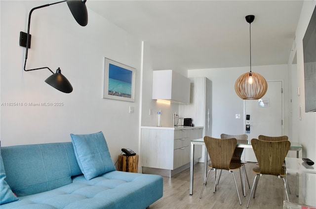 6080 Collins Ave Unit 506, Miami Beach, FL 33140 - living room with light wood-type flooring