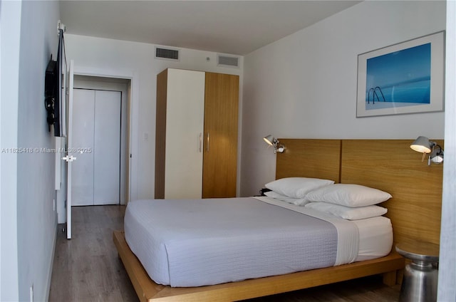 6080 Collins Ave Unit 506, Miami Beach, FL 33140 - bedroom featuring wood finished floors