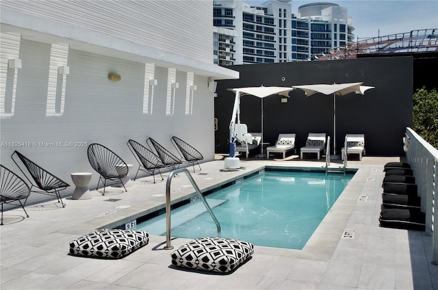 6080 Collins Ave Unit 506, Miami Beach, FL 33140 - community pool featuring a patio