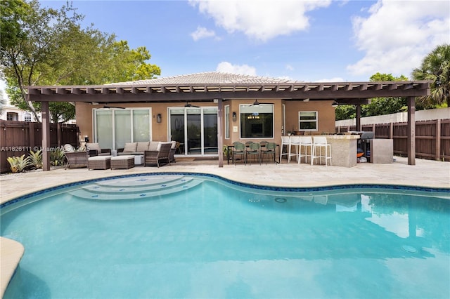 10989 NW 73rd Ter, Doral, FL 33178 - view of swimming pool featuring outdoor lounge area, a fenced backyard, a ceiling fan, and a patio