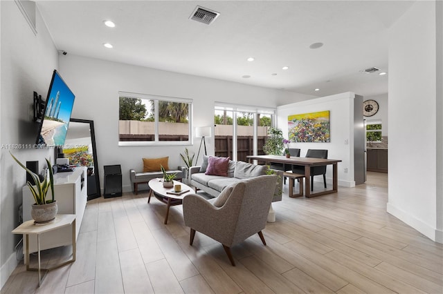 10989 NW 73rd Ter, Doral, FL 33178 - living room featuring recessed lighting and light wood-style floors