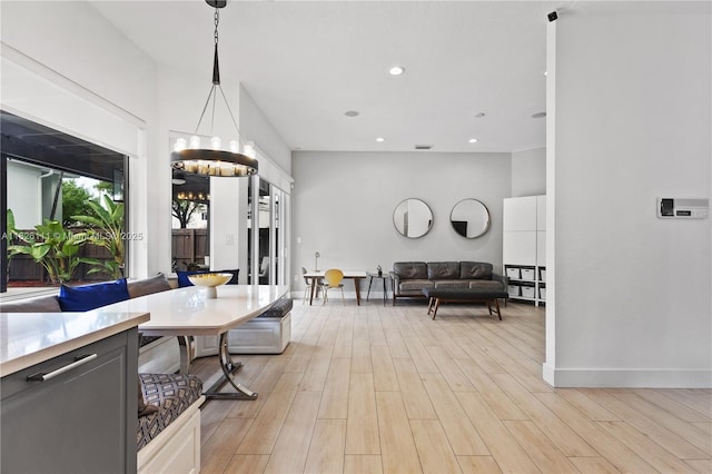 10989 NW 73rd Ter, Doral, FL 33178 - dining area with light wood-style flooring, a chandelier, french doors, and recessed lighting