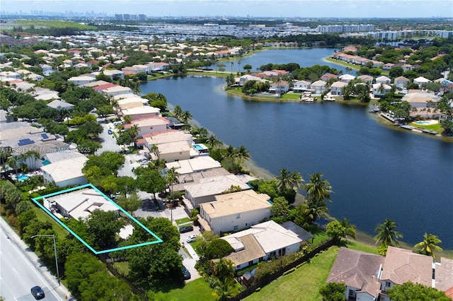 10989 NW 73rd Ter, Doral, FL 33178 - aerial view of residential area with property boundaries highlighted and a large body of water