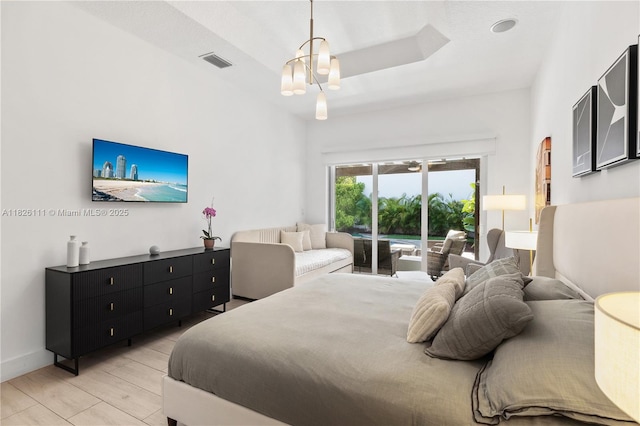 10989 NW 73rd Ter, Doral, FL 33178 - bedroom with light wood finished floors and access to outside